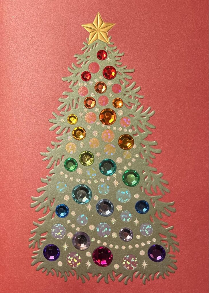 Christmas tree with colored sequin balls in colors of rainbow